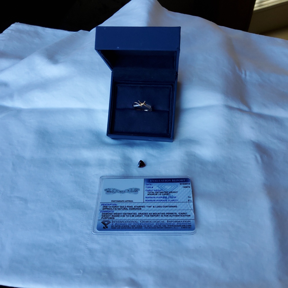 1/2 carat Diamond ring  w/ loose Garnet-needs center stone